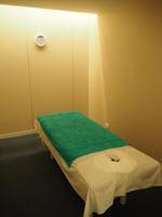 one of spacious treatment rooms